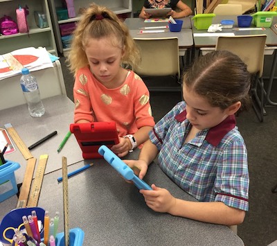 Students learning on the Phonics Hero app