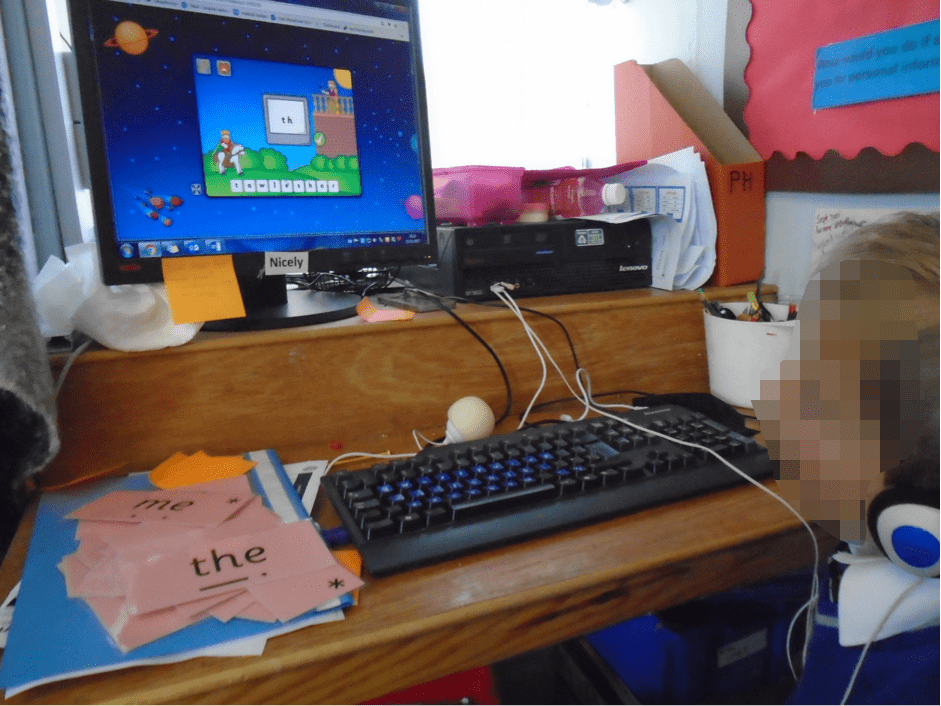 a child learning on the phonics hero web app