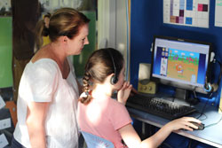 Speech Pathologist using Phonics Hero with a child.